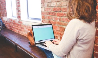 This picture show a woman doing marketing on her laptop.