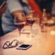 This picture show some people drinking wine.